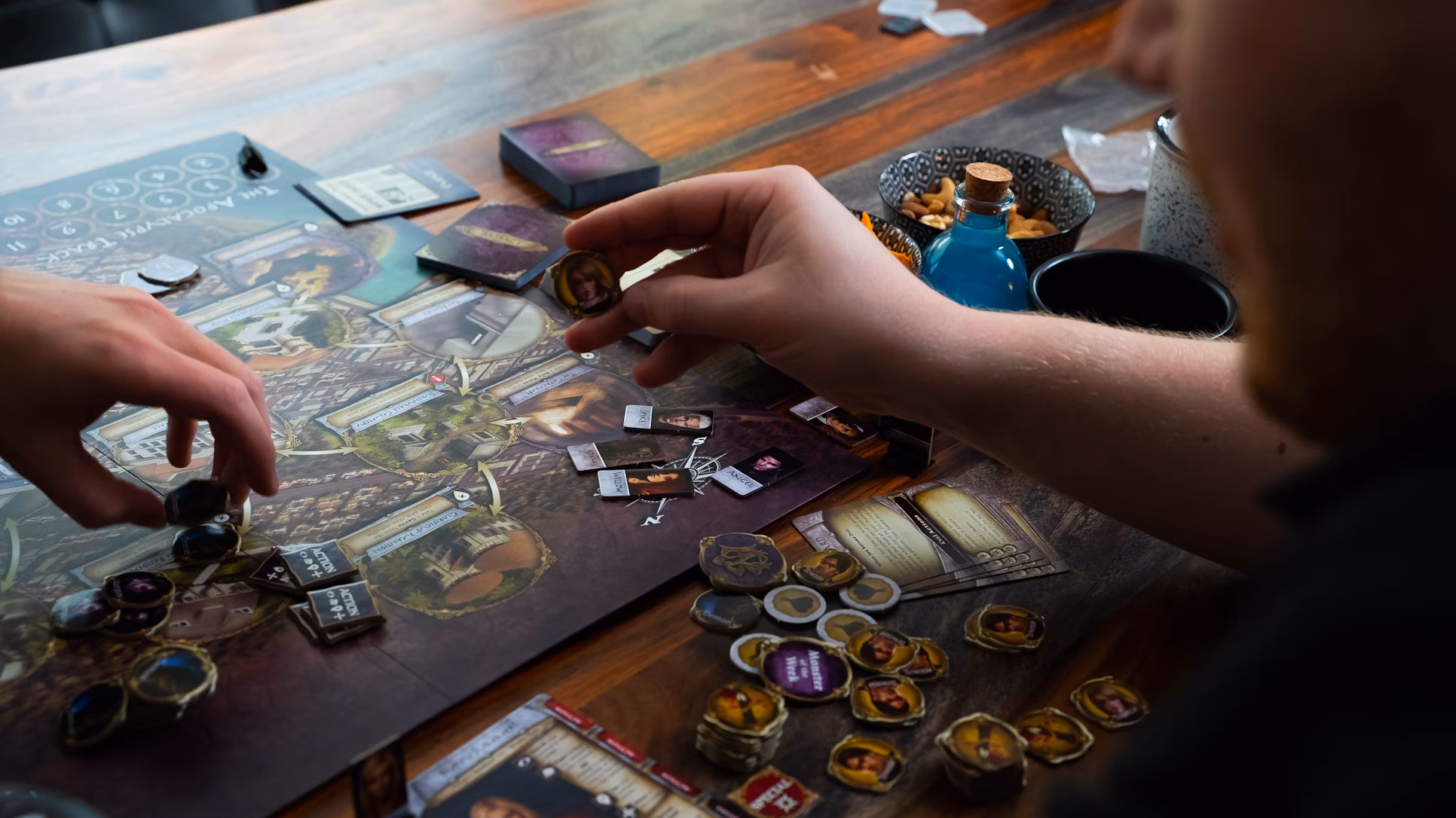 Two people playing a tabletop board game